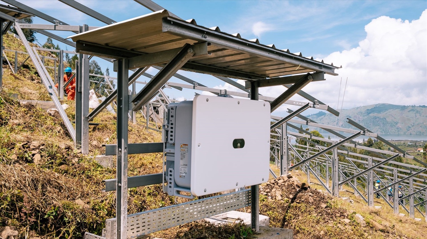 Inverter mounted under solar panels
