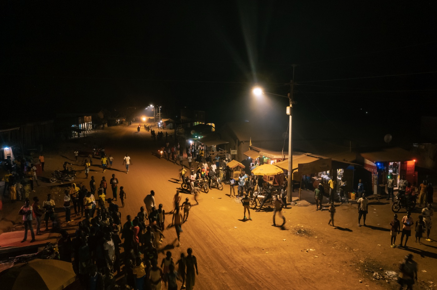 Street lit at night by public lighting