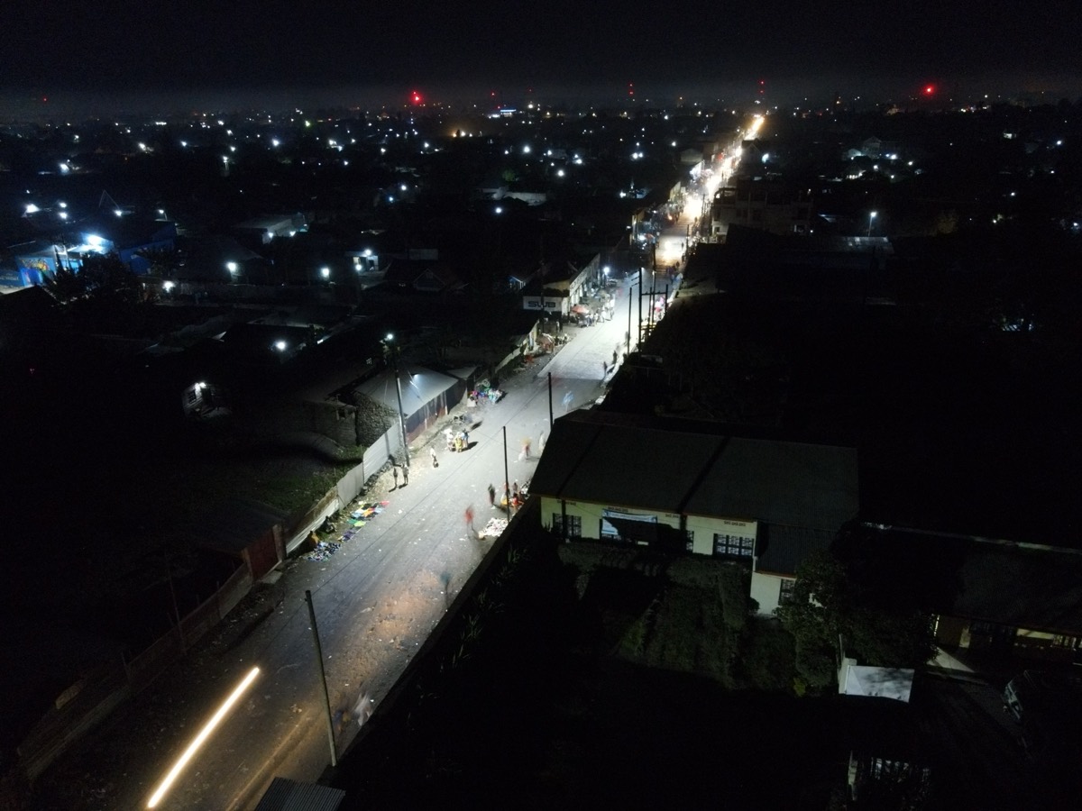 A Goma neighbourhood lit up at night by Nuru power